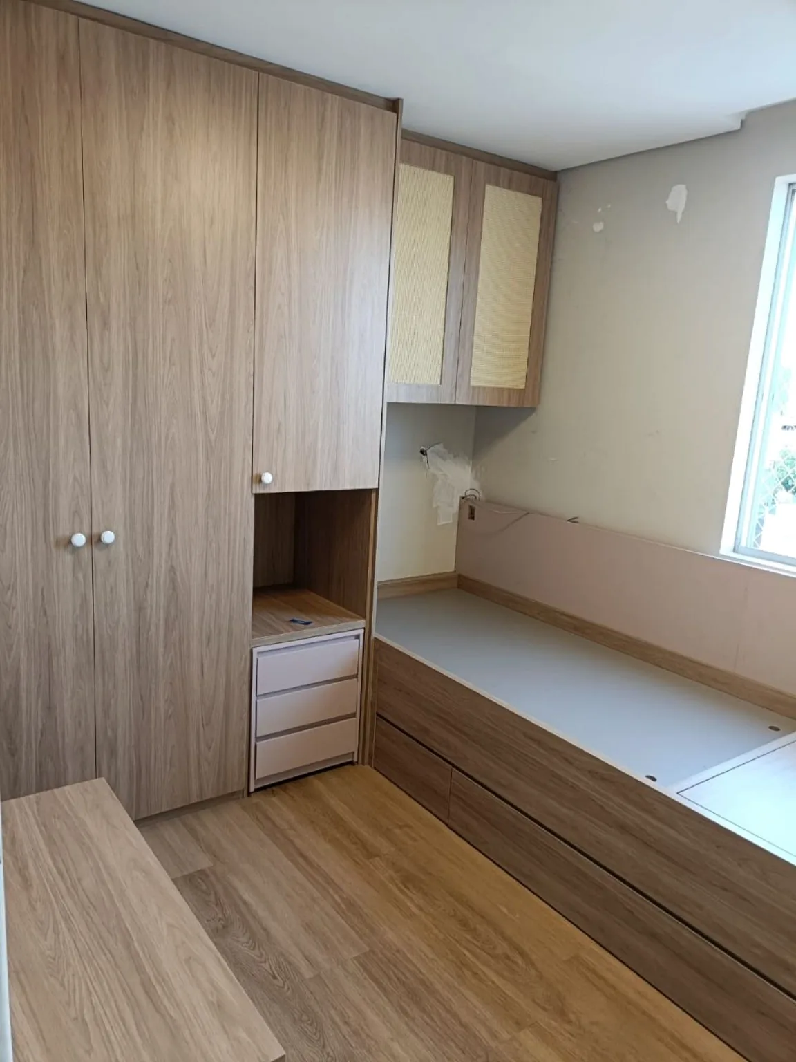 Quarto com móveis planejados